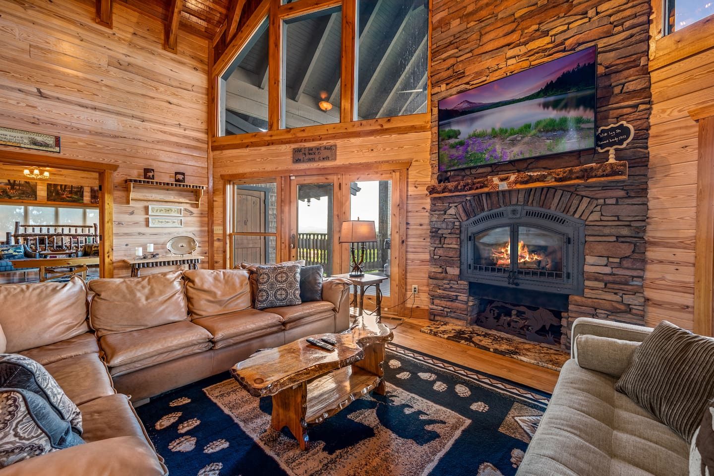 Stacked-stone warmth, soaring timber ceilings and room for everyone to stretch out. This is where movie nights and slow Sunday mornings begin.