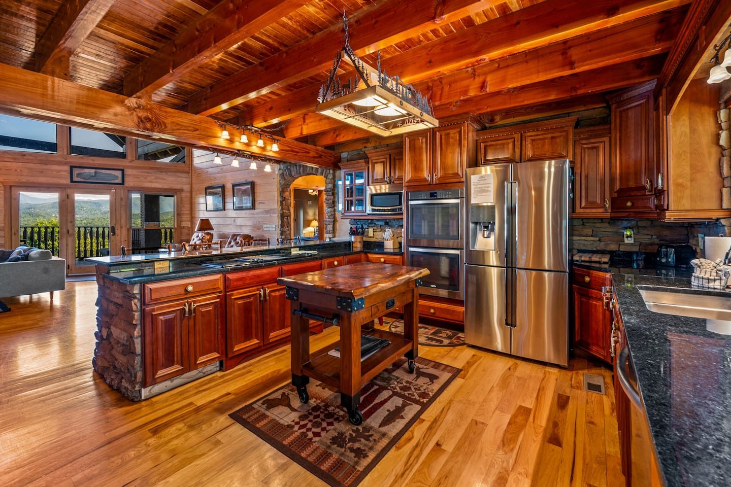 Stainless appliances, a roomy island and mountain views through the windows. Cook together, sip together, and let dinner become the main event.