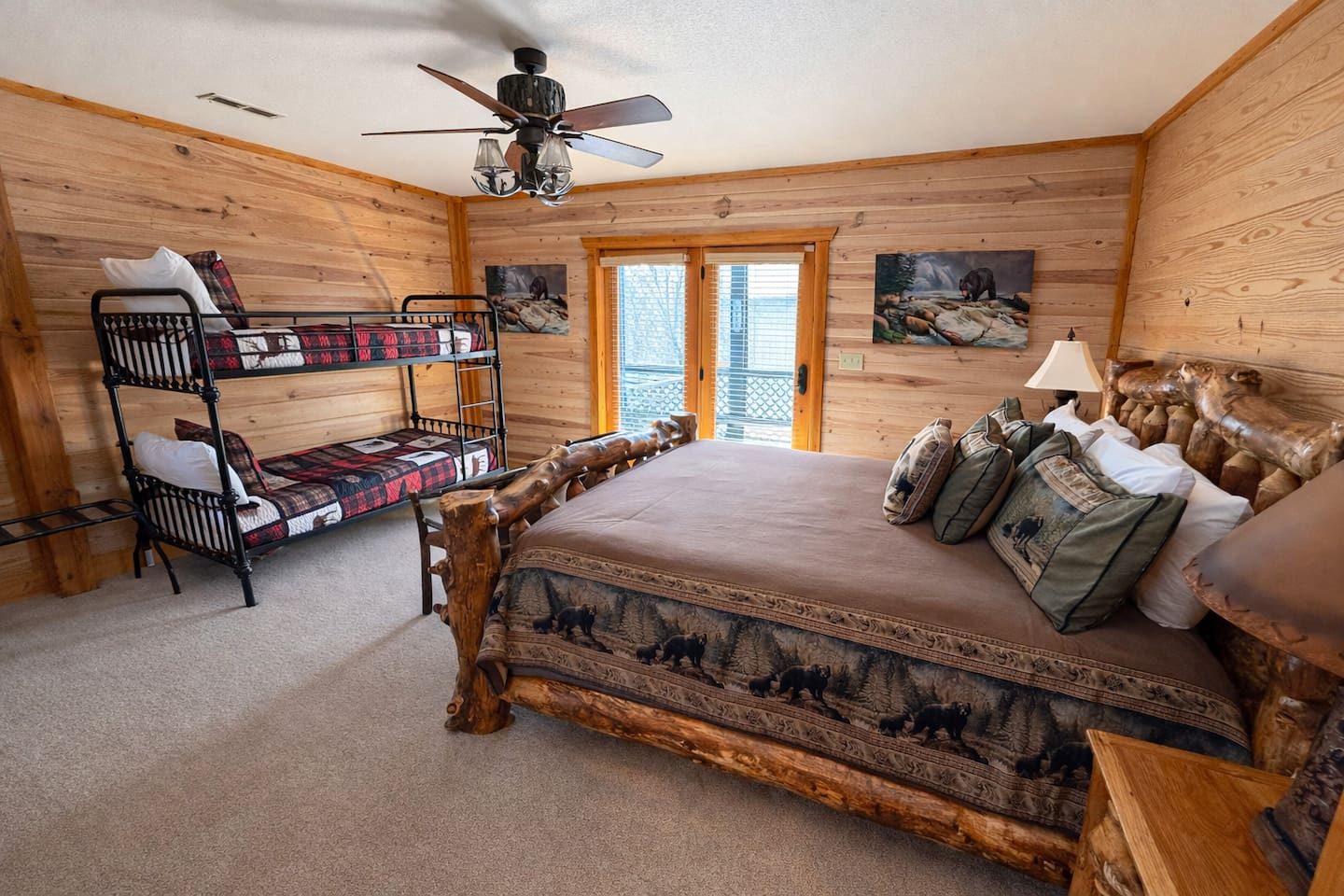 A log king bed and a cozy set of bunks, all dressed in forest-inspired bedding. Bedtime has never been this fun for the little ones.